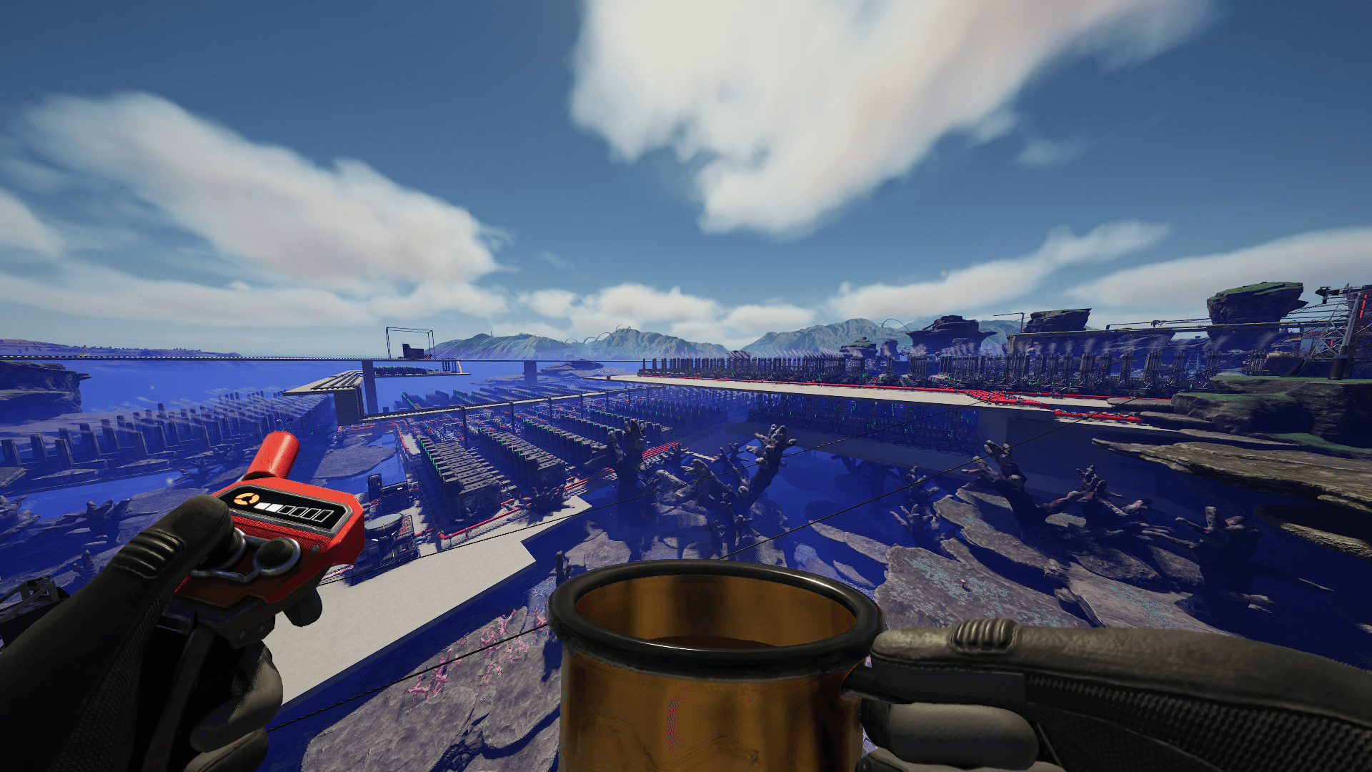 First-person view over a large, neatly organized factory build in the game Satisfactory
